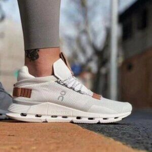 On Running white and tan running shoes